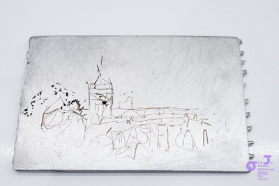 Title of work: Postcard - from Linlithgow  Year: 2025  Material: Recycled aluminium and TECU® Gold copper alloy  Size: 135mm x 90mm