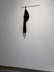 ‘Umbilical (07777688920)’  SMITH/STEWART 2026 (tracksuit bottoms, mobile phone, sound, painted wood, screws)