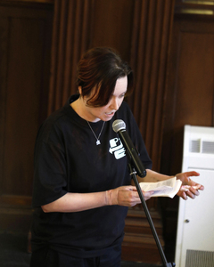 Performance documentation image of Thinskin, spoken word performance at The Participatory Clinic, Glasgow Women’s Library, 17 May 2025. Photograph by Katherine Cox