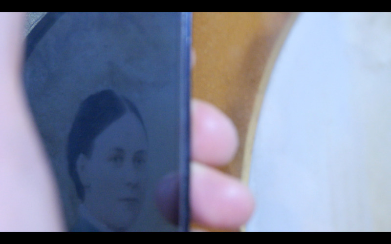 Screenshot from 'Reflections on family portrait with self-portrait'.