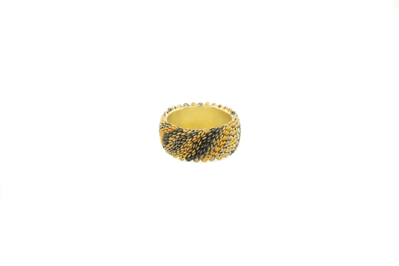 Lenticular Ring - 10 x 23 mm - 18ct yellow, red, white and green gold, platinum, palladium and oxidised silver - 2019 - photography Graham Clark