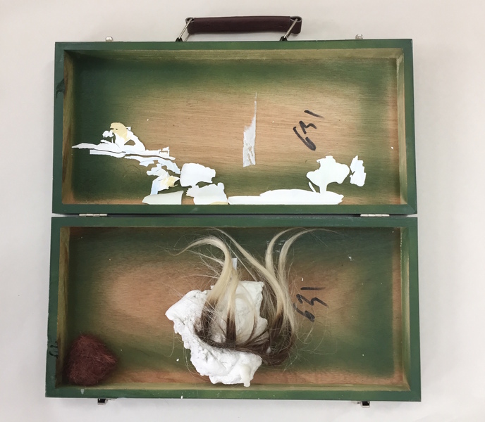 Tray Narrator (2019) Acrylic paint, wooden box, clay, human hair