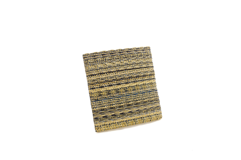 Brooch ‘Linear Frequency III’ - 2023 - Titanium, 18ct yellow, white gold, and silver - 43 x 43 x 7 mm - Photography by Graham Clark