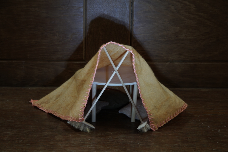 Kitchen table den, 2024, organic brushed cotton dyed with onion skin, onion skin and iron, and avocado stones, balsa wood, dowel and human hair, 18 x 24 x 24cm HxWxD