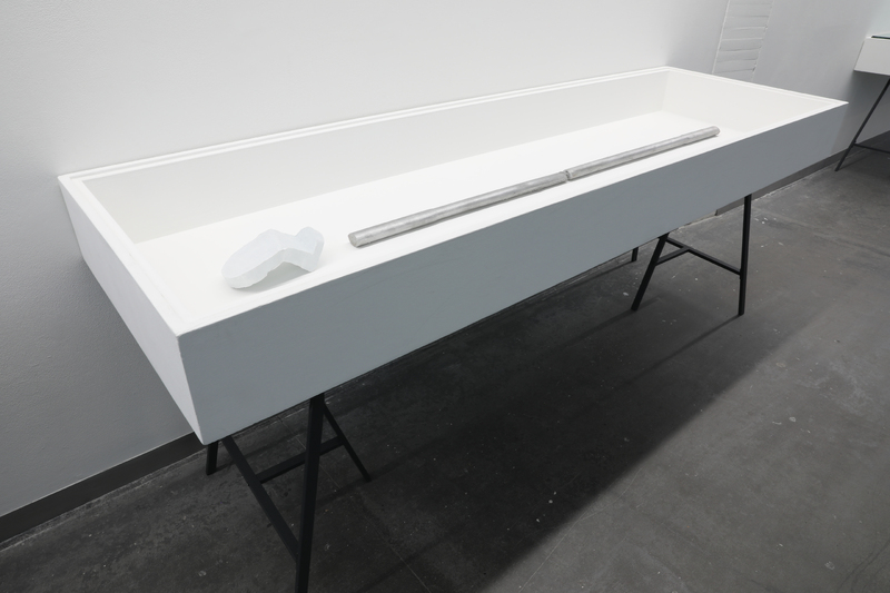 cast aluminium handles + painted bronze 'skull'
