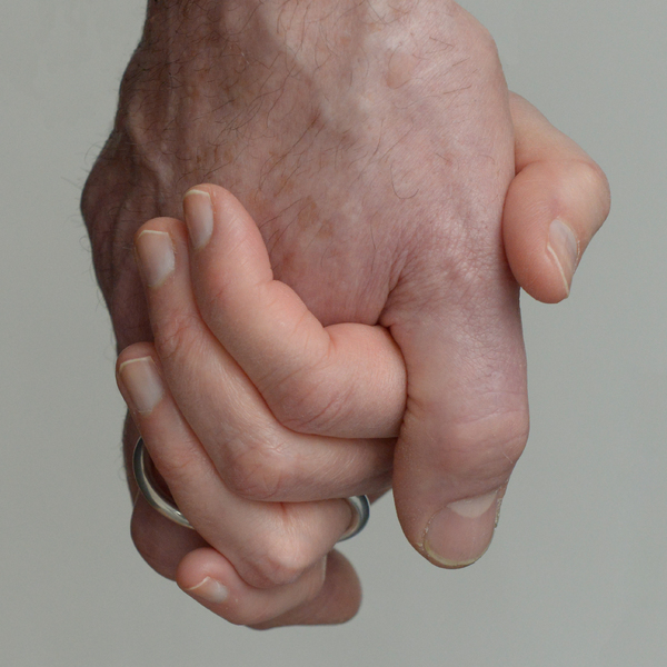 SMITH/STEWART holding hands, wearing '&' 2024