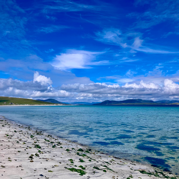 Photograph of a beach with shoreline and sea, location for the Tidelines soundwalk